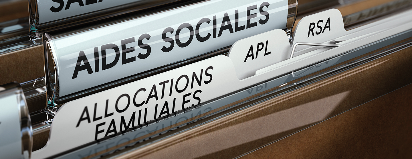 Vue d’un classeur avec la mention « Aides sociales »